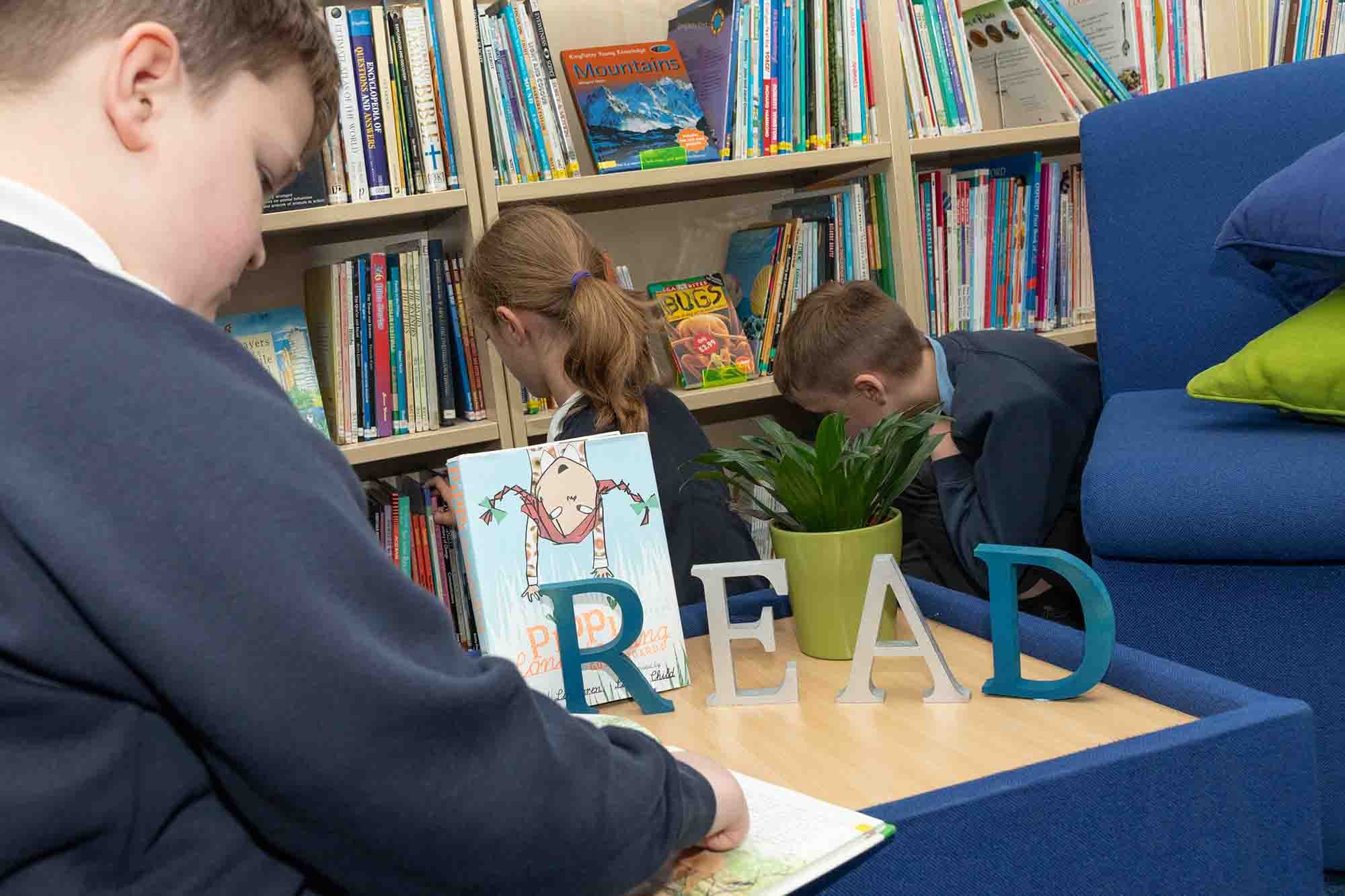 Children reading in the library
